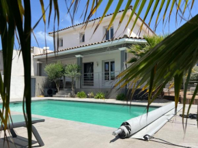 Maison avec piscine chauffée
